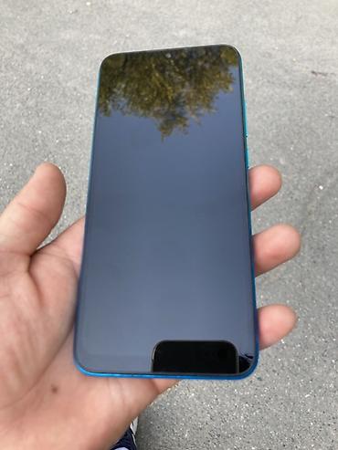 Смартфон Redmi (серия A/9A/9A-like), бирюзово‑синий градиент
