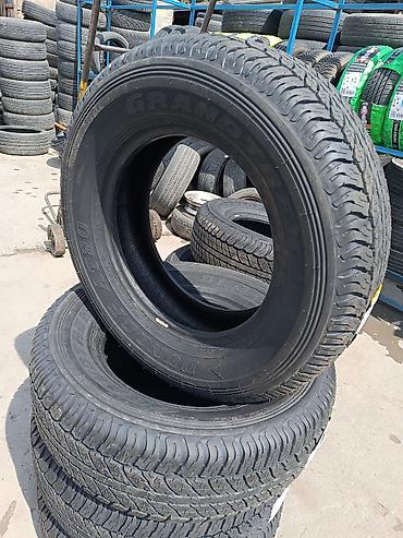 diski 15: Dunlop Grandtrek AT20 avtomobil təkəri. - Ölçü: 26.565 R17 - — 4