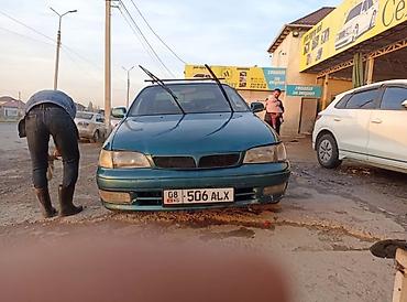 дево нексия 1: Toyota Carina E: 1997 г., Механика, Бензин, Седан — 2