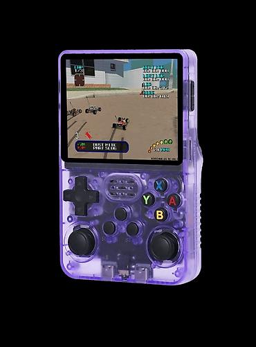 Другие игры и приставки: Retro daşınan oyun konsolu – şəffaf bənövşəyi korpus - 3.5" rəngli — 1