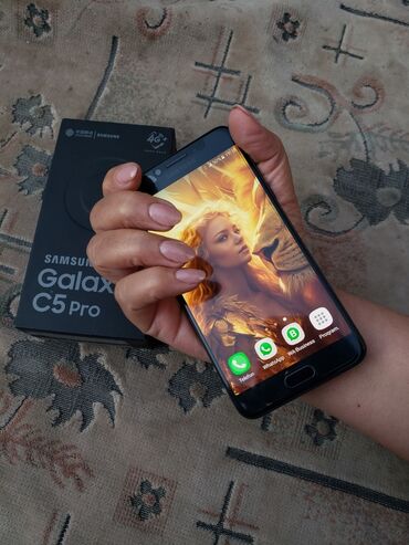 telefon korpus: Samsung Galaxy C5 Pro, 64 GB, rəng - Qara, Sensor, Barmaq izi, Simsiz şarj