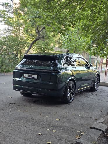 опель внедорожник: Зеленый внедорожник Li Auto L7 с тонированными стеклами и черными