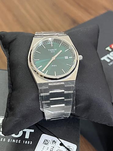 Tissot PRX — швейцарские кварцевые часы с интегрированным стальным