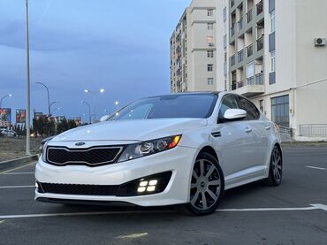Kia: Kia Optima – ağ rəngli, zərif sedan Xarici xüsusiyyətlər: - Aqressiv — 5