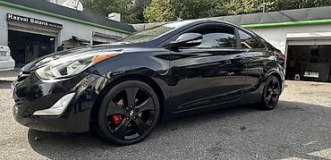 ford focus hatchback: Hyundai Elantra: 2 l | 2014 il Sedan — 4