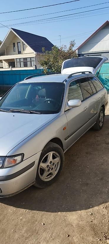 skoda octavia a7: Mazda Capella: 1999 г., 2 л, Механика, Бензин, Универсал — 6