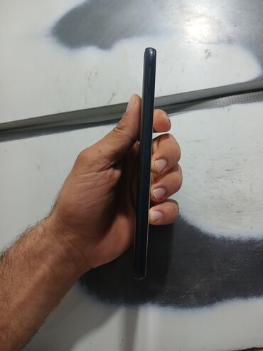 пс 4: Redmi 7A, 4 GB, rəng - Qara, Barmaq izi