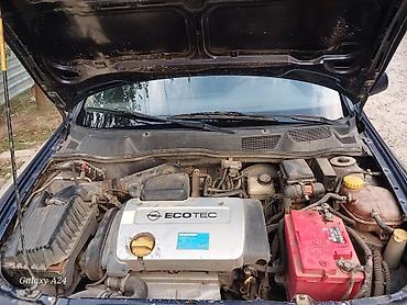 Продажа авто: Opel Astra Caravan (universal), mavi rəng. - Kuzov: universal, dam — 9