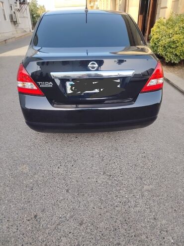 Kabrolar: Nissan Tiida: 1.5 l | 2012 il Sedan