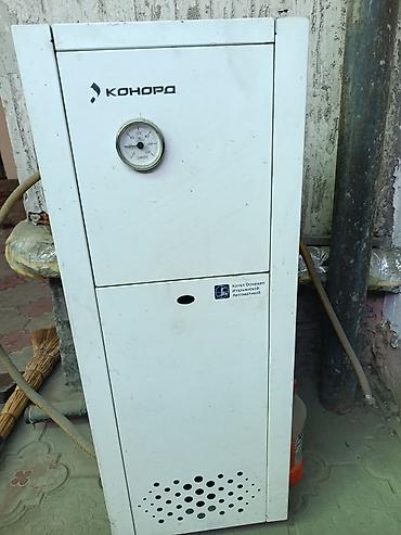 Газовые котлы: Газовый отопительный котёл Konord КСц‑Г 12S-3 - Тип: напольный — 1