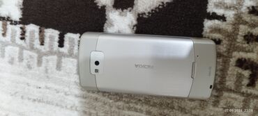 телефони nokia: Nokia 700, цвет - Белый, 2 SIM