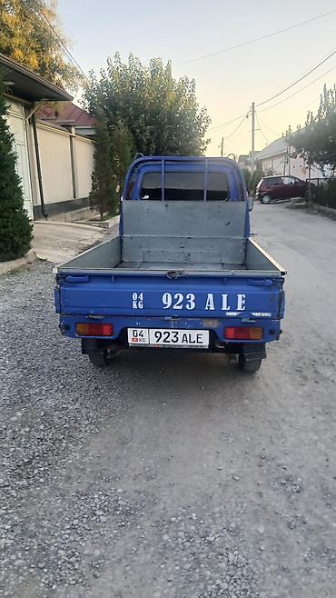 devo matiz: Мини‑грузовик Daewoo Labo (судя по шильдикам на борту) в синим цвете — 4