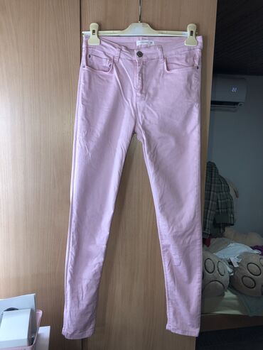 Roze pantalone, obučene svega 2-3 puta, bez oštećenja i očuvane