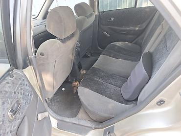 mini coper: Mazda 323: 2000 г., 1.5 л, Автомат, Бензин, Седан — 4