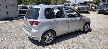 росрочка афто: Mazda Demio: 2003 г., Автомат, Бензин — 7