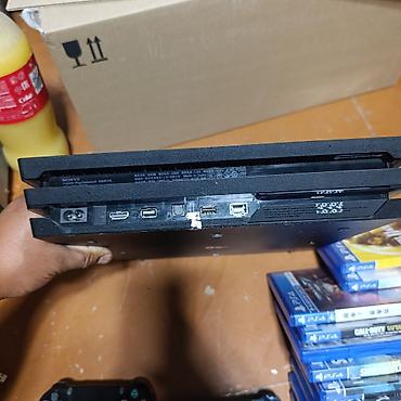 швей машинка: PlayStation 4 Pro (черная) + 2 геймпада DualShock 4 + набор дисков ИЛИ — 5