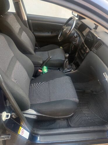 Toyota: Toyota Corolla: 1.4 l | 2004 il Sedan — 7