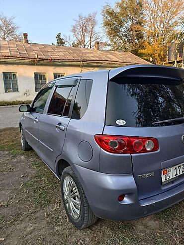 рестайл: Mazda Demio: 2005 г., 1.3 л, Автомат, Бензин, Хэтчбэк — 6