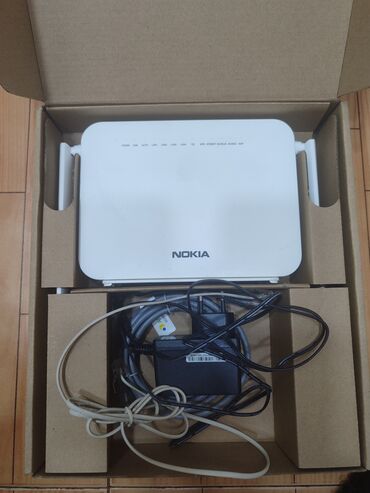 Modemlər və şəbəkə avadanlıqları: Модем Nokia. Gipon. Мало использованный новый