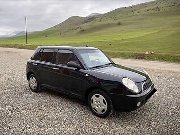 LIFAN: Lifan 320, 5 qapılı kompakt hetçbek. Xarici: - Qara rəng, xrom qapı — 1