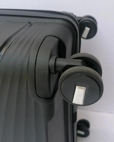 Putni koferi i torbe: Tvrdi kofer na točkiće – crni, sa šarama u dijagonalnom reljefu — 3