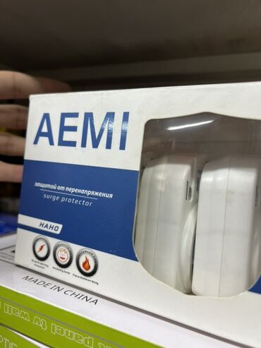 Электротоварлар: Устройство защиты от перенапряжения AEMI. Компактное устройство белого