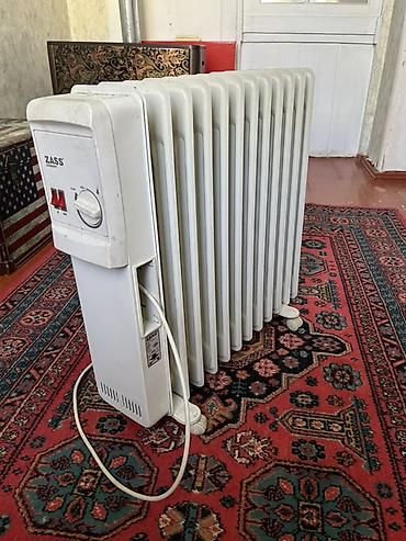 zass radiator: ZASS Germany markalı, ağ rəngdə yağlı radiator. Bu radiator, otaqların — 1