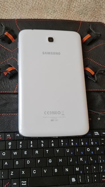 iphone tablet: Kožna futrola sa ugrađenom žičnom tastaturom za tablet (oko 7–8 inča) — 9
