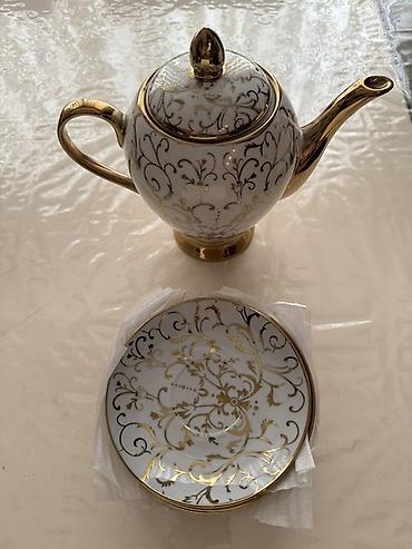 Рыбы: Porcelain çay dəsti – zərif qızılı naxışlı Məhsulun tərkibi: - 1 ədəd — 1