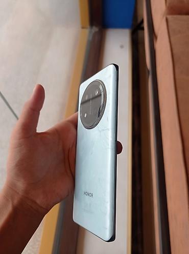Мобильные телефоны: Honor 9C, 256 ГБ, цвет - Голубой, Сенсорный — 4