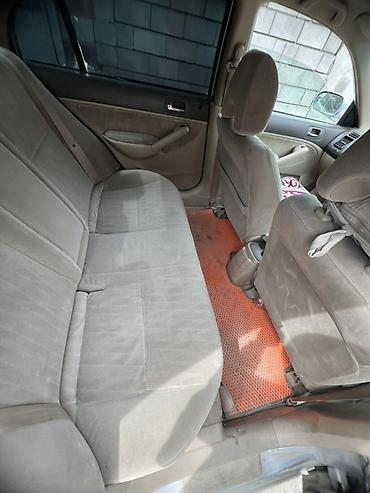 Другой транспорт: Honda Civic седан, поколение VII ( 2002 гг.), серебристый цвет — 9