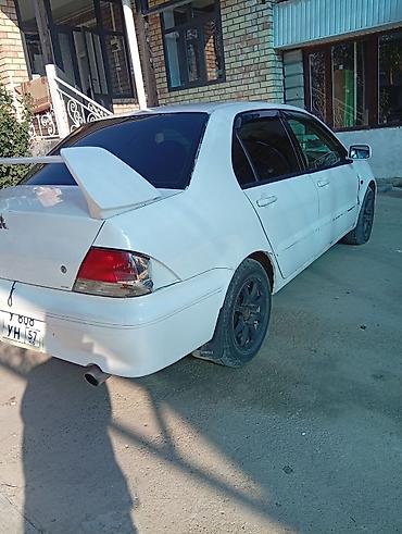 Mitsubishi Lancer: 2002 г., 1.5 л, Автомат, Бензин, Седан — 2