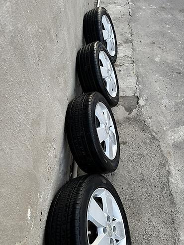 16 şam disk: 4 ədəd yüngül lehimli disk və təkər komplekti - Disklər: Kia orijinal — 4