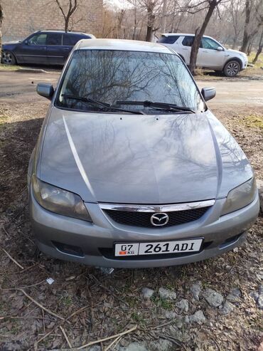 Mazda: Mazda 323: 2002 г., 1.6 л, Механика, Бензин, Хэтчбэк