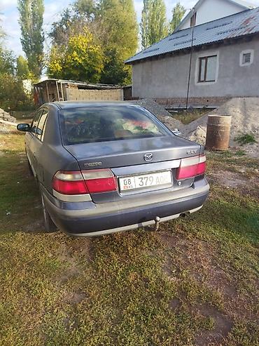 sprinter 516: Mazda 626: 1999 г., 1.8 л, Механика, Газ, Седан — 5