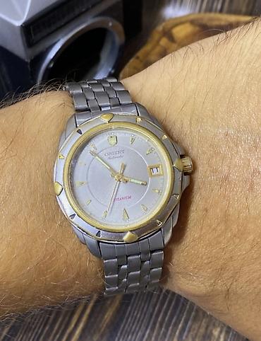 saat alan: Orient Mechanical Titanium qol saatı - Korpus və qolbaq: titan – — 2