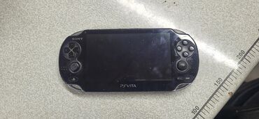 компьютер купить бишкек: Портативная игровая консоль Sony PS Vita, выполненная в черном цвете