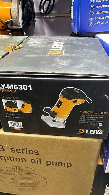 Строительное оборудование: Ручной кромочный фрезер LEIYA LY-M6301 Основные характеристики — 1