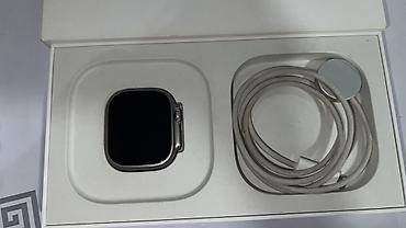 Apple Watch Ultra 2(титановый корпус) — часы и магнитная зарядка в