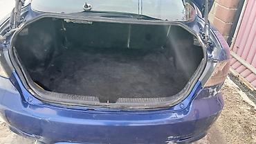 Другие детали салона: Mazda Atenza (правый руль) — интерьер - Салон бежево‑черный, тканевые — 10