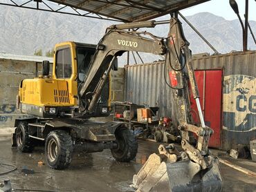 купить вольво тандем в европе: Экскаватор, Volvo, 2003 г., Колесный