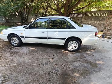 полироль для авто: Mazda 626: 1991 г., 2 л, Механика, Бензин, Седан — 6