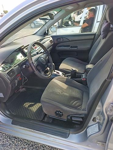 мутсибиси лансер: Mitsubishi Lancer: 2002 г., 1.6 л, Автомат, Газ, Седан — 8
