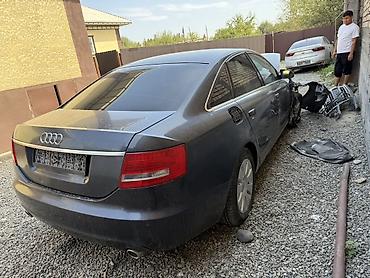 компрессоры б у: Audi A6 C6 (седан, дорестайлинг), тёмно‑серый цвет. Автомобиль после — 6