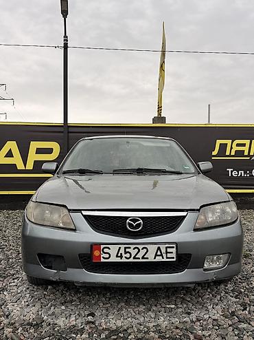 mazda 2000: Mazda 323: 2002 г., 1.6 л, Механика, Бензин, Хэтчбэк — 1