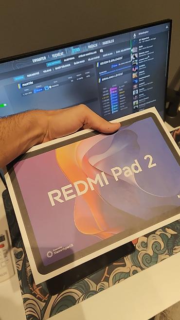 xiaomi pad mini: Redmi Pad 2 planşet Xüsusiyyətlər: - Geniş ekran: nazik çərçivəli — 1