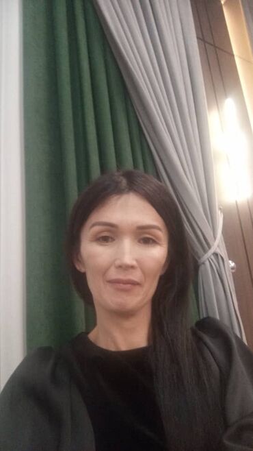 женские юбки с баской: Стильная женская блузка черного цвета с длинными рукавами. Модель
