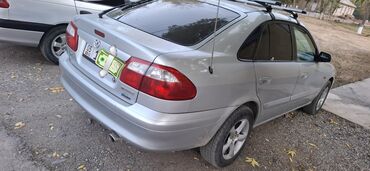 купить чехлы на гольф 4: Mazda 626: 2001 г., 2 л, Механика, Бензин, Хэтчбэк