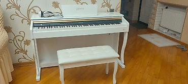 pıano: Təzədir heç işlənməyib 2000manata piano alınıb masası isə — 3