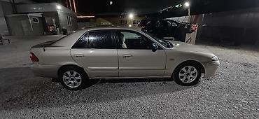 Продажа авто: Mazda Capella: 2001 г., 1.8 л, Механика, Бензин, Седан — 4